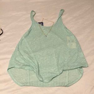 Sea green and white tank